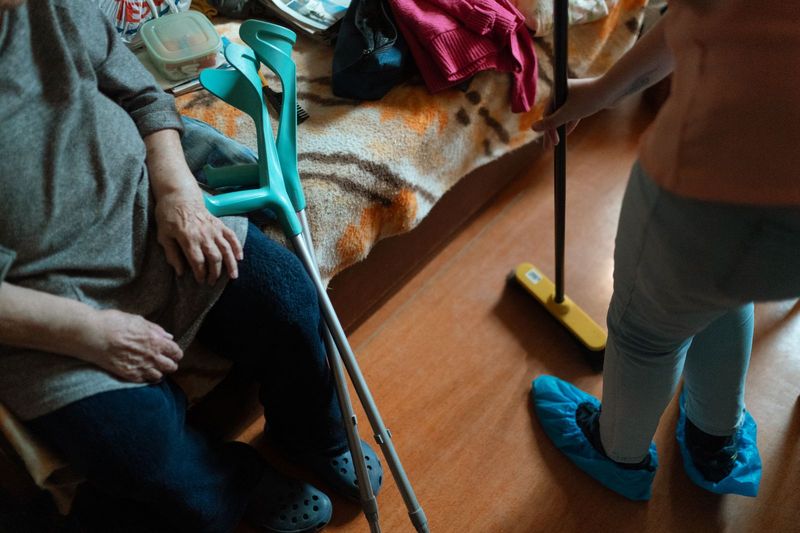 An aide helping with housework