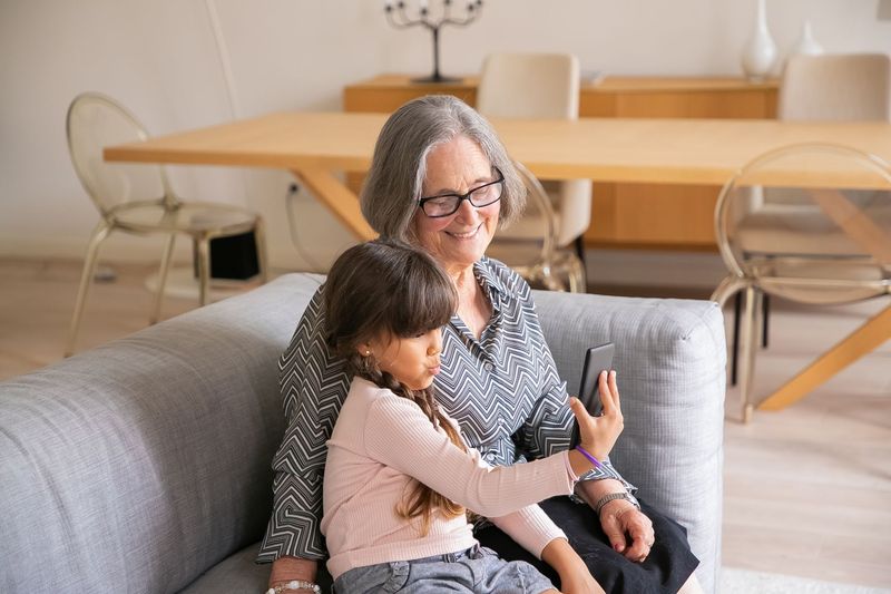 An older woman smiling at home